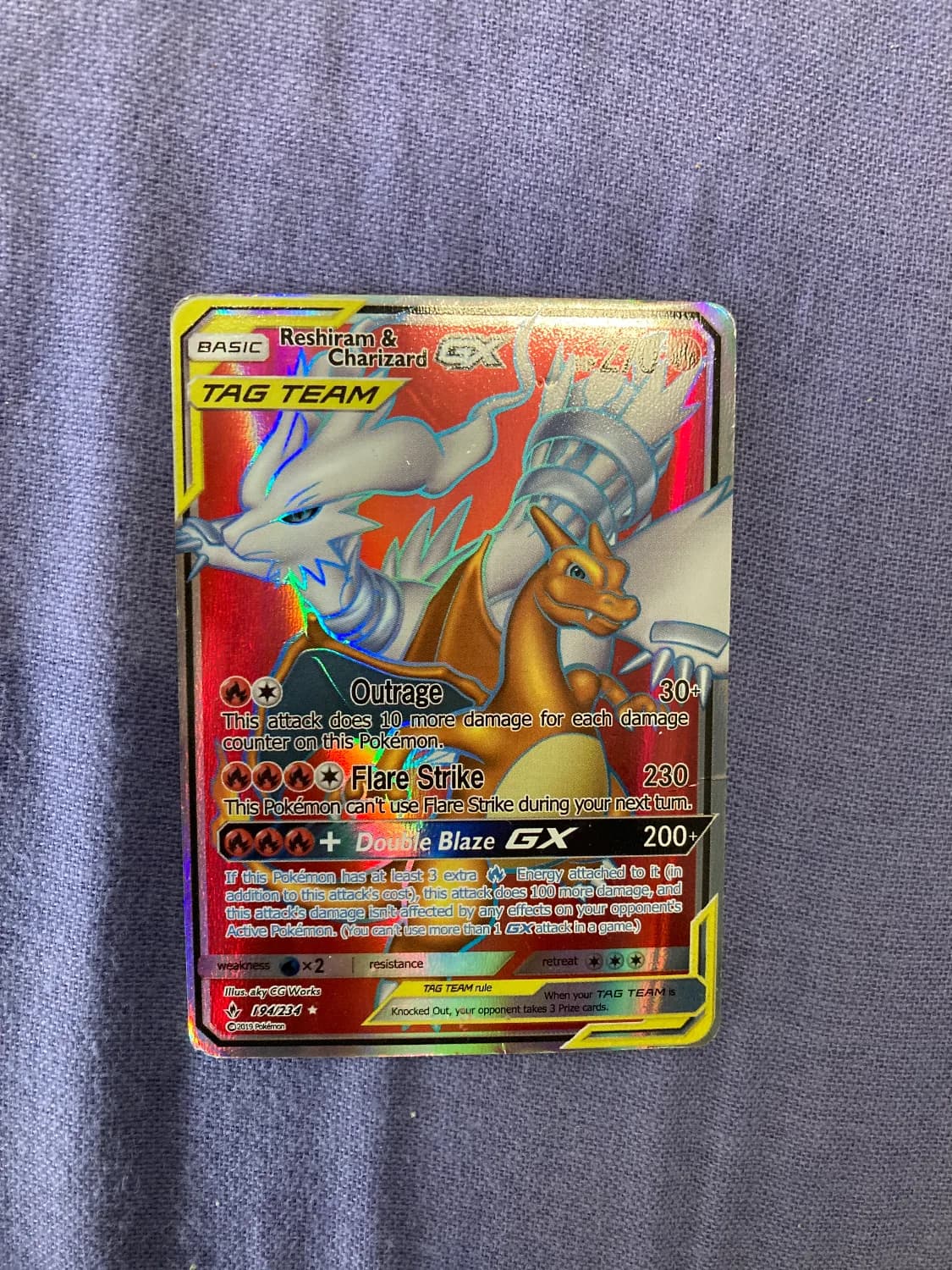 Reshiram & Charizard-GX — Unbroken Bonds 194